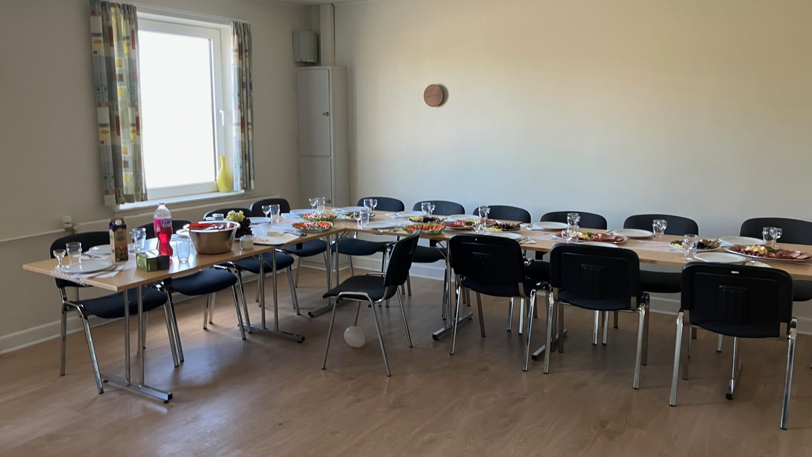 The party room with the long table set before the guests arrived